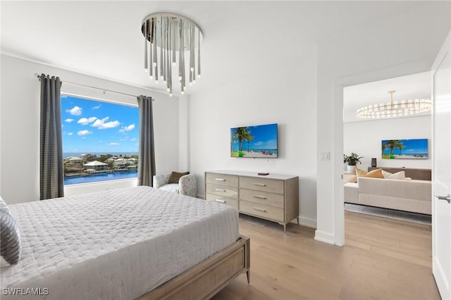 bedroom with light wood-type flooring