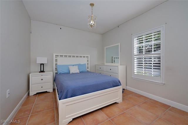 tiled bedroom featuring multiple windows