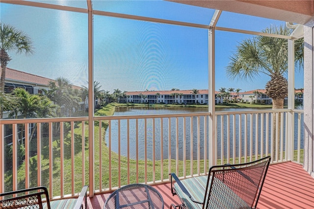 sunroom with a water view