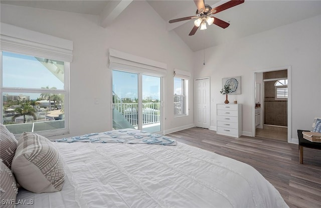 bedroom featuring hardwood / wood-style floors, ceiling fan, high vaulted ceiling, and access to outside