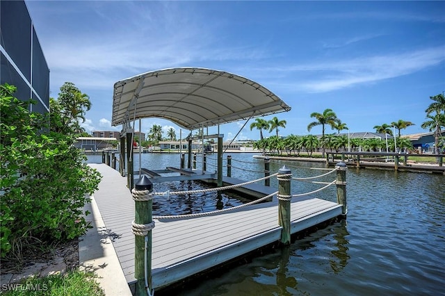 view of dock with a water view