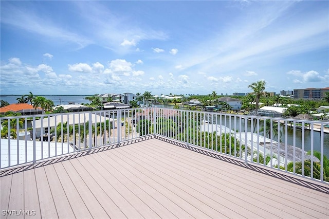 deck featuring a water view