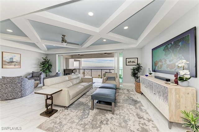 living room with beamed ceiling, ceiling fan, and coffered ceiling