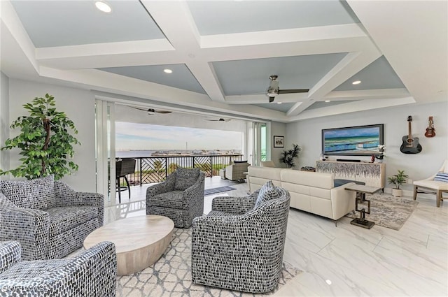 living room featuring ceiling fan, beam ceiling, and coffered ceiling