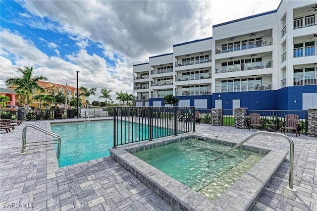 1425 Park Beach Cir Unit 149, Punta Gorda, FL 33950 - community pool featuring ceiling fan and a community hot tub