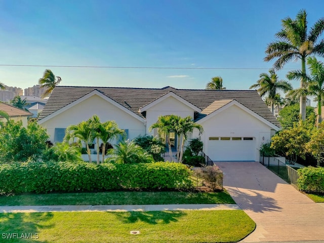 view of front of property with a garage