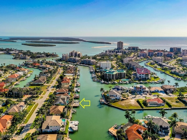 drone / aerial view featuring a water view