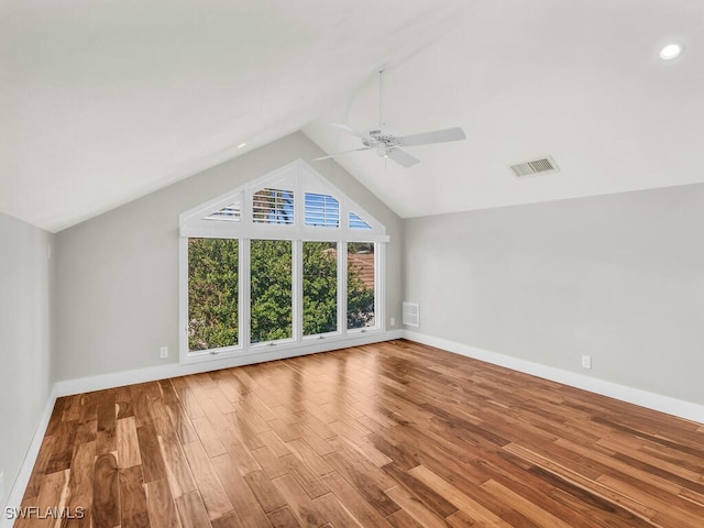 additional living space with hardwood / wood-style floors, ceiling fan, and lofted ceiling