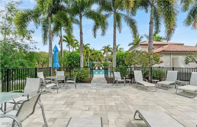 view of patio with a community pool