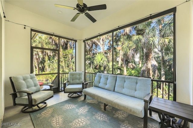 sunroom / solarium with ceiling fan