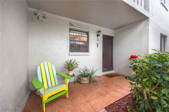 property entrance with covered porch