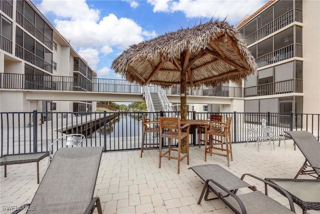 view of patio / terrace featuring a water view