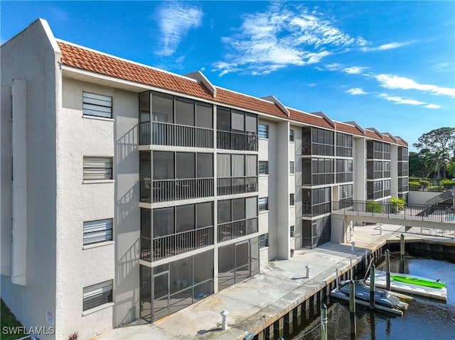 view of building exterior featuring a water view