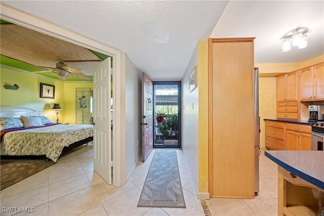 hallway with light tile patterned floors