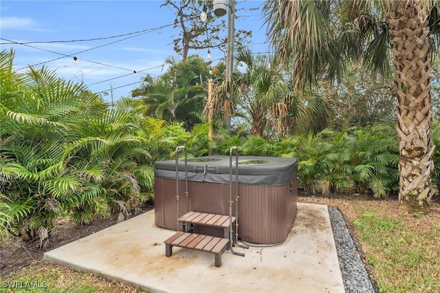 view of patio with a hot tub