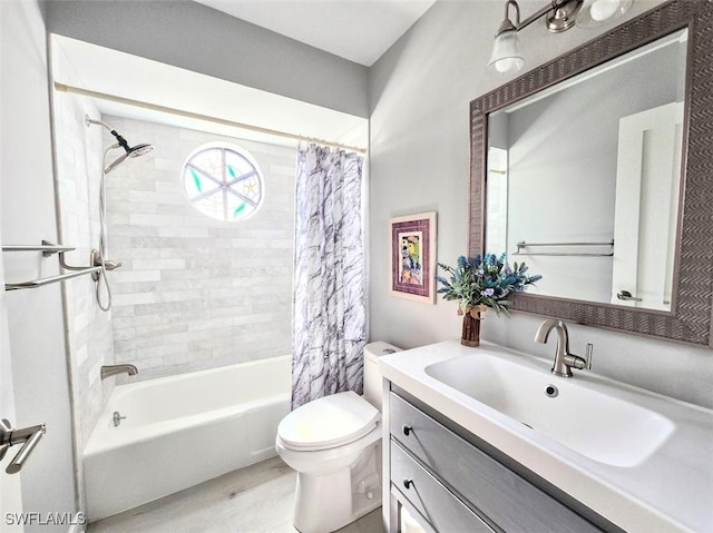 full bathroom featuring vanity, shower / tub combo with curtain, and toilet