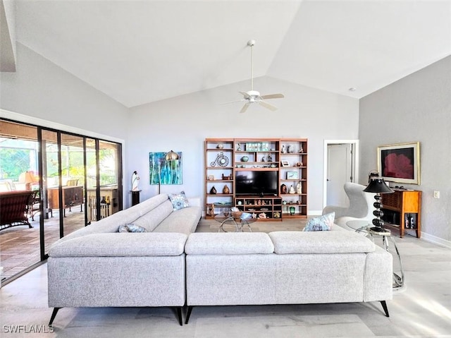 living room with high vaulted ceiling and ceiling fan