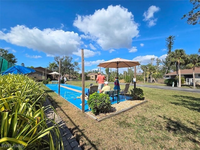 view of playground featuring a lawn