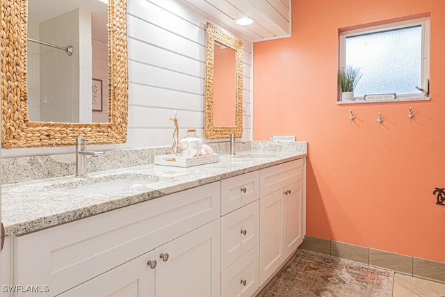 bathroom with vanity and tile patterned floors