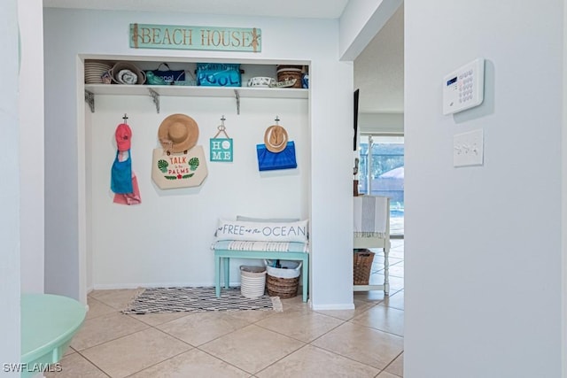 mudroom featuring tile patterned flooring