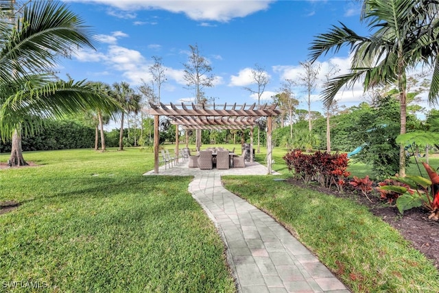 view of yard with a pergola and a patio area