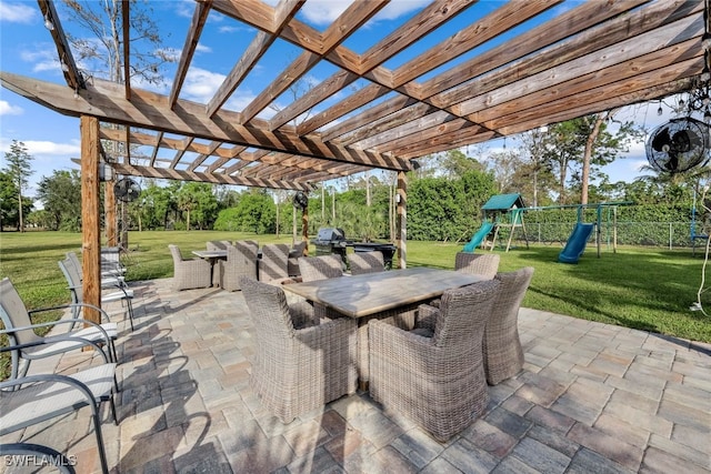 view of patio / terrace with a playground and a pergola