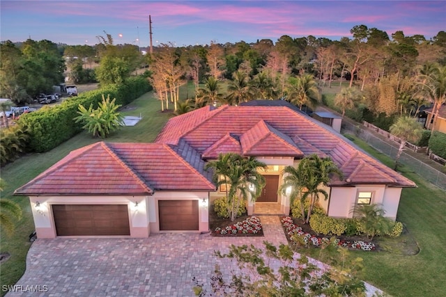 view of front of property featuring a garage