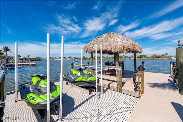 view of dock with a water view