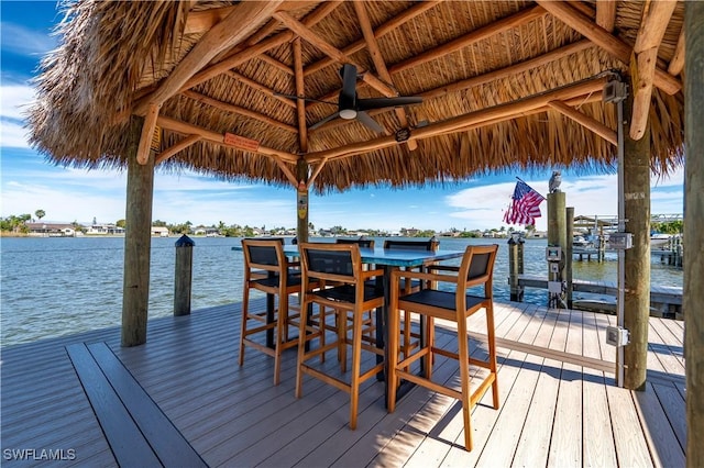 dock area featuring a gazebo and a water view