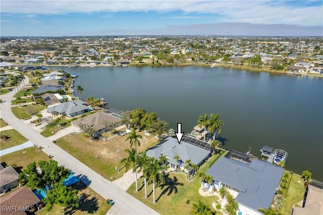 bird's eye view with a water view