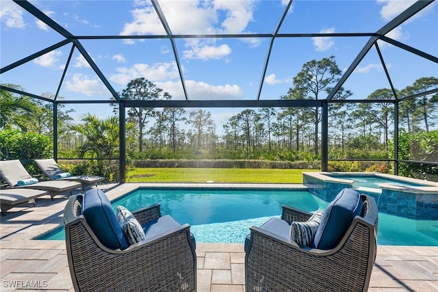 view of swimming pool featuring an in ground hot tub, a lanai, and a patio area