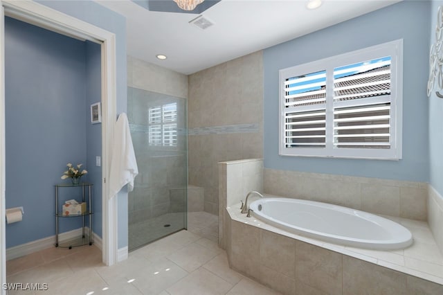 bathroom featuring tile patterned floors and plus walk in shower