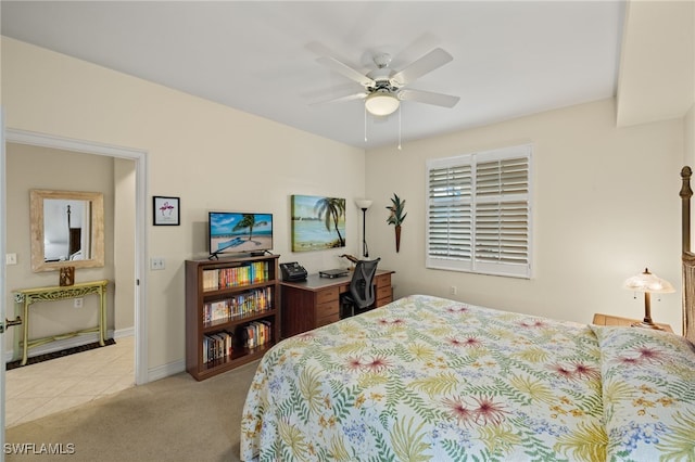 bedroom featuring ceiling fan and light colored carpet