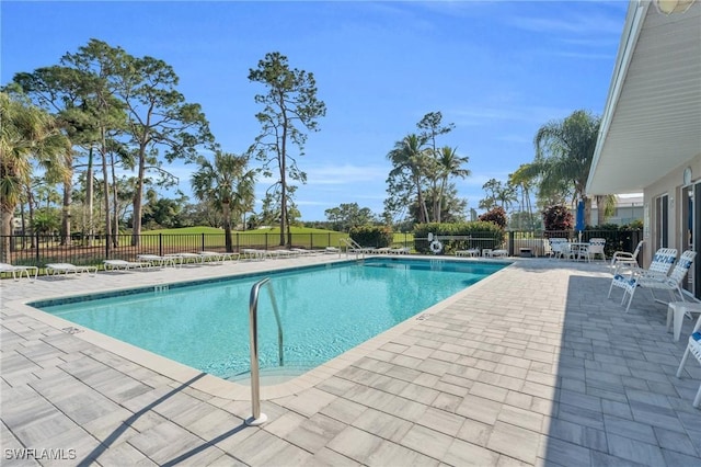 view of pool featuring a patio