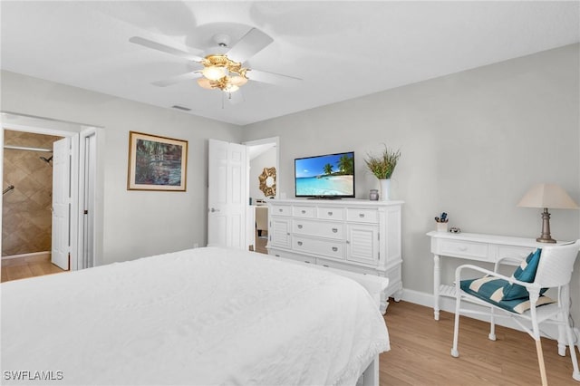 bedroom with ceiling fan and light hardwood / wood-style flooring