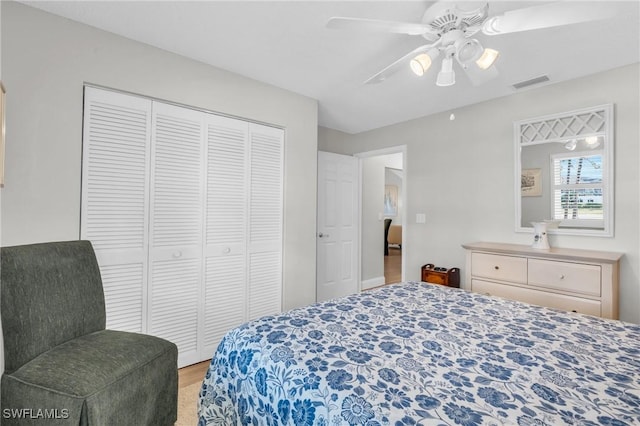 bedroom with a closet and ceiling fan