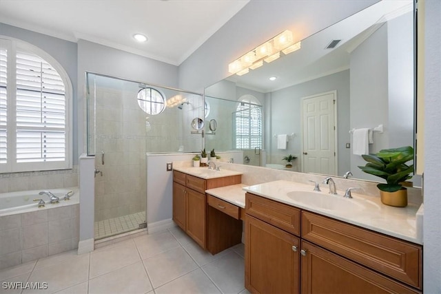 bathroom featuring vanity, crown molding, tile patterned floors, and shower with separate bathtub