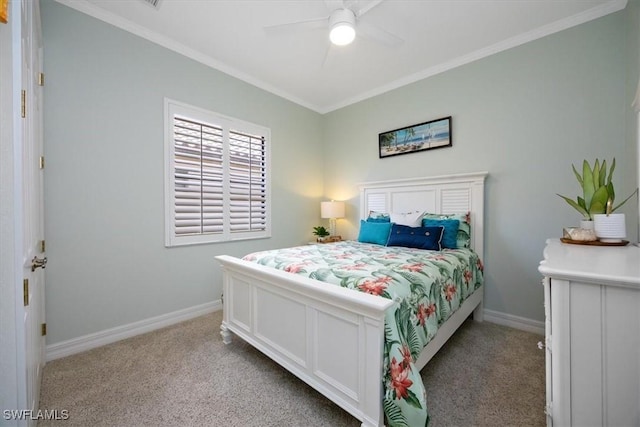 carpeted bedroom with crown molding and ceiling fan