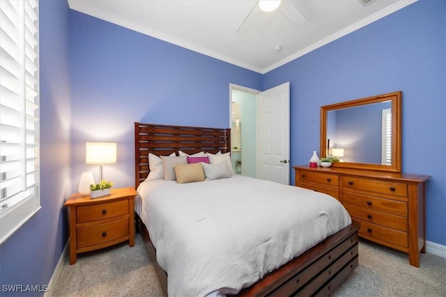 bedroom featuring crown molding, ceiling fan, and light carpet