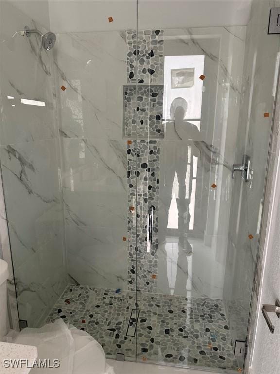 bathroom with walk in shower