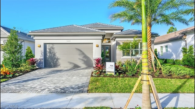 view of front of house with a garage