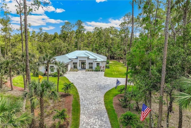 view of front of home with a front lawn