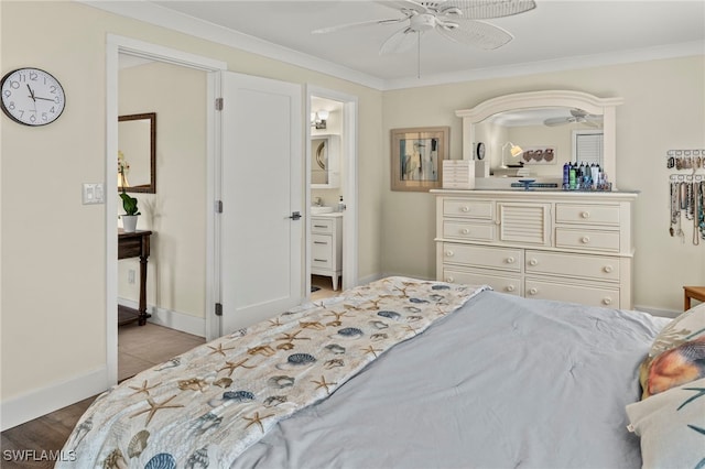 bedroom with light wood-type flooring, connected bathroom, ceiling fan, and ornamental molding