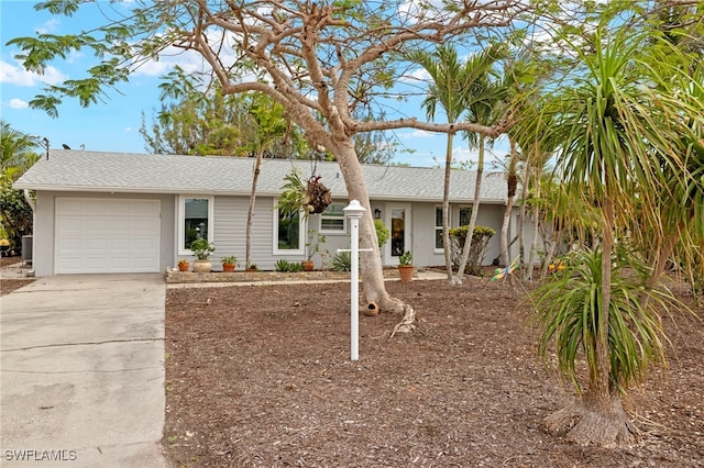 single story home with a garage