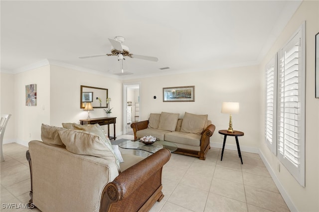 living room with light tile patterned floors, ceiling fan, and ornamental molding