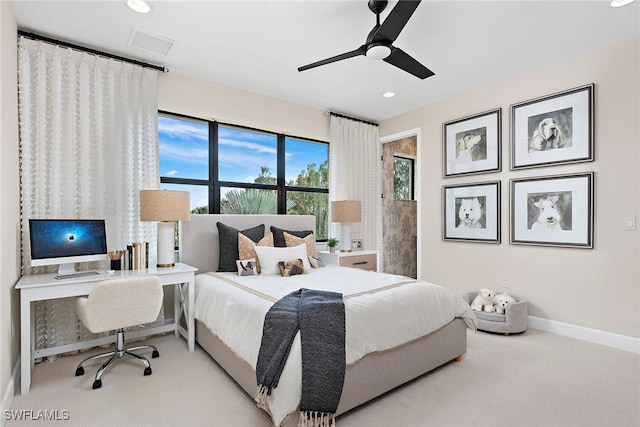 carpeted bedroom with ceiling fan