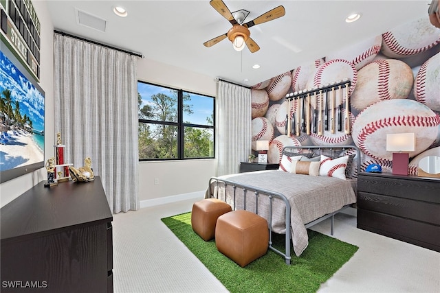 carpeted bedroom with ceiling fan