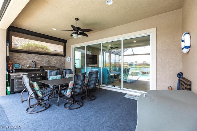 view of patio with ceiling fan