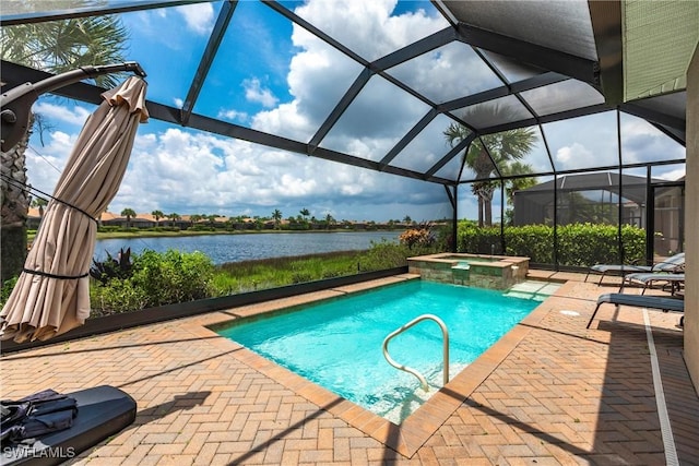 view of pool featuring an in ground hot tub, a water view, a lanai, and a patio area