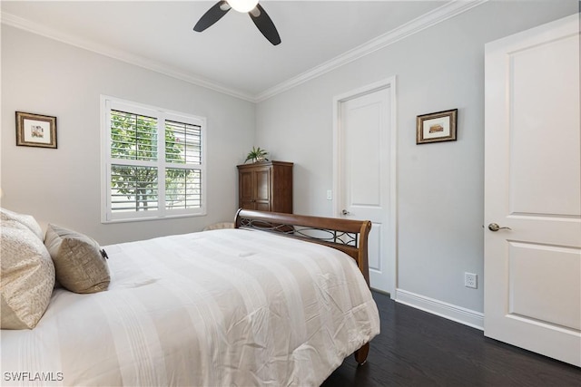 bedroom with ceiling fan, dark wood-type flooring, and crown molding